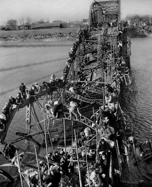 Flight_of_Refugees_Across_Wrecked_Bridge_in_Korea_(Original).jpg